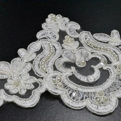 China 3D TUTON design high quality 3D beaded high quality fashion wedding embroidery 100% polyester flower lace fabric for sale