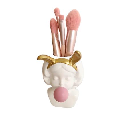 China Best Selling Eco-Friendly Bubble Girl Resin Pen Holder Makeup Decorative Blowing Vase Brush Tabletop Storage for sale