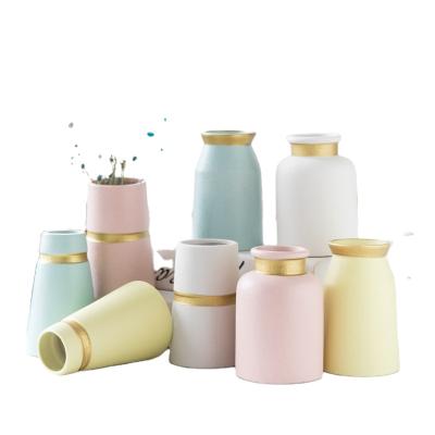 China Art Decor 2021 new style porcelain ceramic flower vases for wedding party home decor for sale