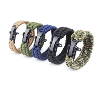 China Promotion Gift Wristband Camouflage Parasol Lightweight Outdoor Rope Woven Survival Whistle Bracelet for sale