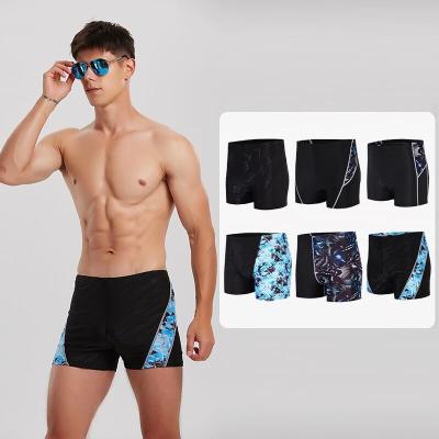 China 2023 High Quality Custom Antibacterial Mens Sports Boxers Mens Summer Beach Shorts High Stretch Quick Dry Surf Sports Print Shorts for sale