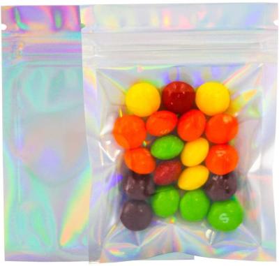 China Custom Design Holographic Rainbow Clear Zipper Plastic Three Side Packaging Bag for sale