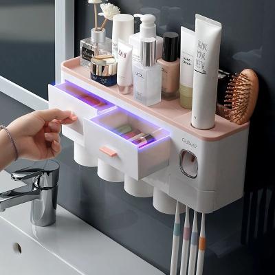 China 2022 Hotel Factory Price Bathroom Sets Automatic Toothpaste Dispenser and Toothbrush Holder USB Toothpaste Sterilizer Dispenser for sale