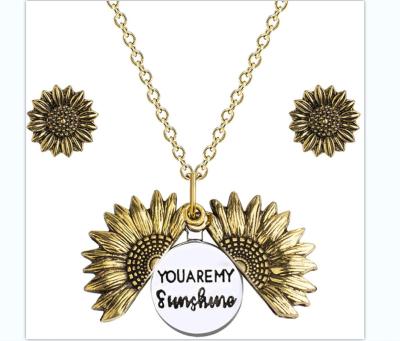 China Vintage Hot Sale Double Sided Open Sunflower Lettering Jewelry Accessories Pendant Necklace for sale