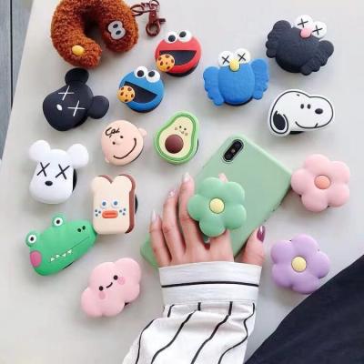 China Manufacture Mobile Phone Accessories Silicone PVC Cute Cartoon Socketted Holder Grip with Custom Logo and Fix Mode Holding for sale