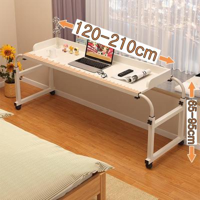 China Wooden Portable Desk Adjustable Lazy Cross Bed Table with Wheels for Modern Home Furniture in Bedroom for sale