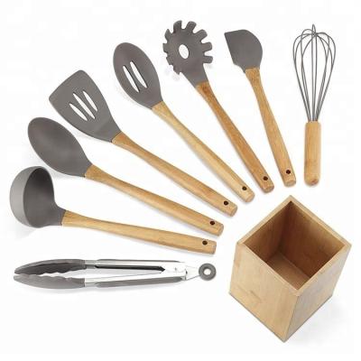 China Sustainable Amazon 9pc Silicone Kitchen Utnesil Set With Bamboo Handle And Rack In Stock for sale