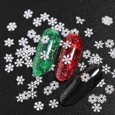 China Nail Art Decoration Wholesale Christmas Snowflakes Slices Nail Art Glitter white Metallic 3D ornament Accessories Snowflakes Christmas nail art for sale