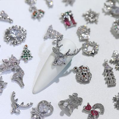 China Finger Decoration 2023 metal Charm Silver Shiny Zircon Diamond Rhinestones Christmas Nail Snowflake Garland Christmas festival Nail Art Decoration for sale