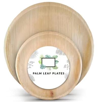 China Modern Compostable Biodegradable Chic Palm Leaf Plates 10 Inch Round Party Disposable Paper Plates for sale