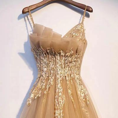 China Dry Cleaning Women Party Dresses Lace Fabric Sequin Beaded Luxury Gold Arabic Wedding Dresses 2022 for sale