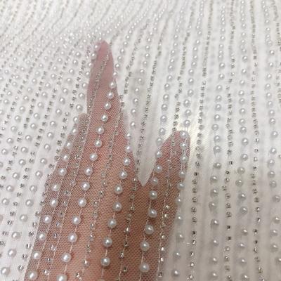 China Beautiful workable pealrs with pearls fabric for dress elegance embroidery lace fashion bridal apparel for woman fabric for sale