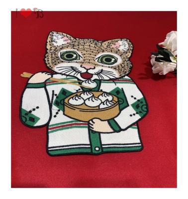 China Soft to touch bun eating cuty cat patch made with glass beads and multi colored polyester yarn for fashion dress for sale