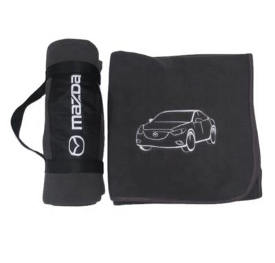 China Promotional Cheap Small Portable Logo Folding Fleece Blanket Portable And Foldable Customized Blanket for sale