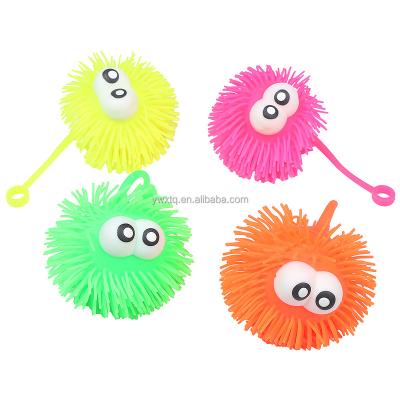 China XTQ Material Factory Direct Sale Eco-Friendly Flashing Squeeze Toys Puffer Ball Proptosis Hairy Ball With Long Hair for sale