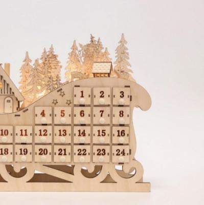 China Advent wooden calendar in traditional antique sleigh shape for sale