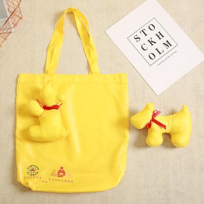 China Hot Selling Yellow Dog Doll Design Custom Logo Cloth Creative Folding Reusable Shopping Bags for sale