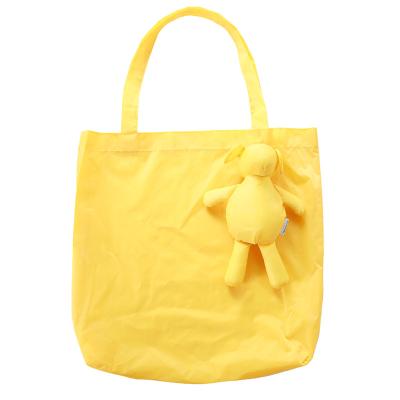 China Wholesale Creative Custom Folding Pig Doll Yellow And Pink Design Shopping Bags for sale