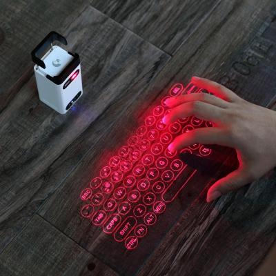 China Wireless Keyboard+mouse+mobile phone holder+mobile power supply is suitable for Bluetooth laser projection keyboard. for sale