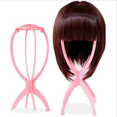 China Water Wave Wig Stand For Placing Hair Rack Barber Care Tool Accessories Special Plastic Folding Headgear Holder for sale