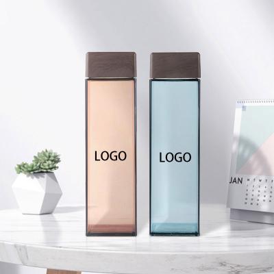 China New Arrivals 500ml Water Bottle Square Shape Bamboo Lid Plastic Water Bottle Lid Sustainable Plastic Wood Lid Water Bottle for sale