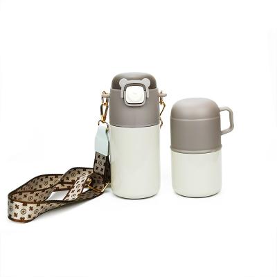 China PORTABLE Luxury 650ml Kids Vacuum Thermoses 316 Stainless Steel Kids Travel Portable Thermos Vacuum Flask With Two Lids&Rope For Girl for sale