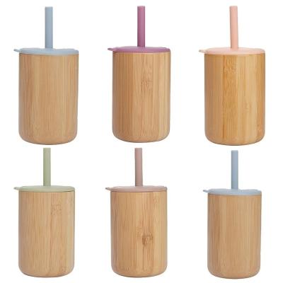 China Sustainable Leakproof Bamboo Silicone Sippy Cups Kids Learning Sippy Drinking Cup for sale