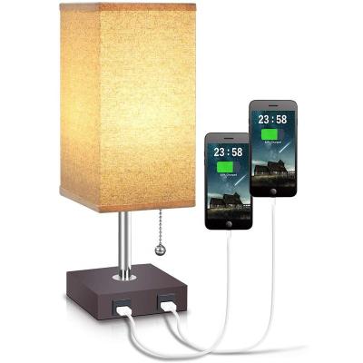 China Lighting Works Modern Fabric Wood Bedside Lamp With USB Port for sale