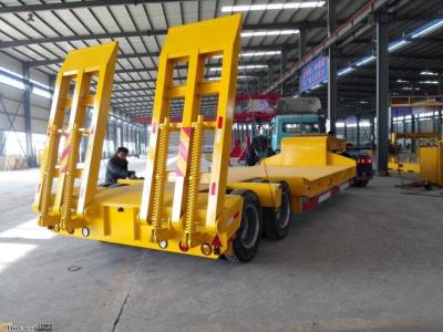 China Economic 2 Axles 40 Tons Low Bed Semi Trailer With Heavdy Duty Steel Spring Ramps for sale