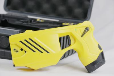 China Tri Function Dual Cartridge Low Power Stun Gun For Protection Remote Control for sale