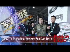 CCTV Journalists experience stun gun test at Police Expo