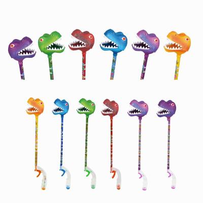 China Novelty Natural Candy Toys Big Mouth Dinosaur Stick Puppet Grabbers Toys Candy With Sweet Candy for sale