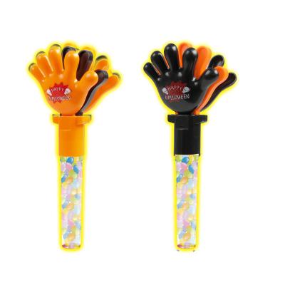 China Natural Hand Clapper Halloween Candy Confectionery Plastic Candy Toys for sale