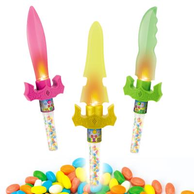 China The Fresh King Light Up Saber Toy Candy Swords Normal Boy Shooting Candy Toys for sale