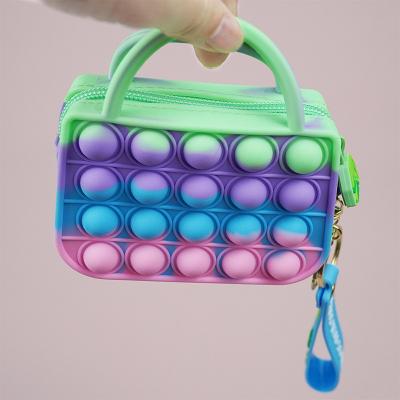 China Mini Elegance Decompression Silicone Rainbow Fashionable Hot Selling Busty Person Cute Clutch With Key Chain for sale