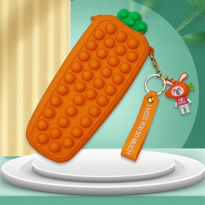 China Fashionable Wholesale Silicone Pressurized Single Pencil Case Vegetable Pop Bubble Stationery Box Carrot Stationery Tableware Storage for sale