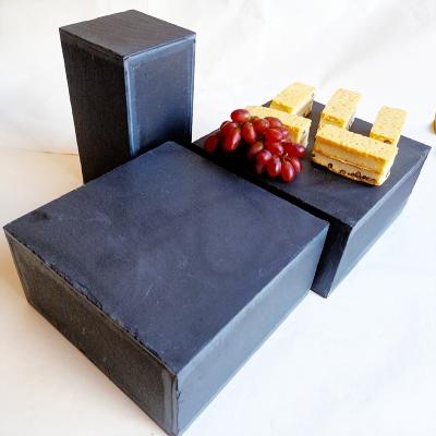 China Restaurant Serving Party Food Rack Personalized Salte Buffet Stone Column Box Display Custom Wholesale Natural Material Black Rack Equipment for sale