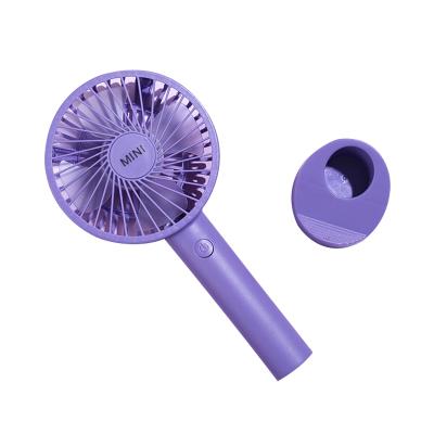 China Multifuntional Handheld Electric Battery Table Fan/USB Hands Free Charging Fans With Mobile Phone Bracket for sale