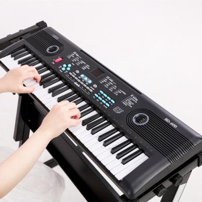 China Electronic Organ Multifunctional Musical Electric ABS Toy Piano Keys Toy 61 Keys Plastic Keyboard For Children for sale