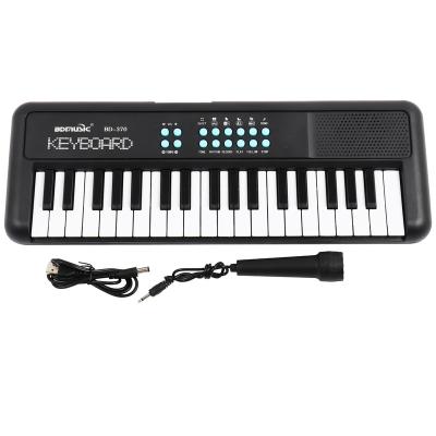 China Toy Educational Instrument Mini Keys Play Piano 37 Keys Play Digital Keyboard Electronic Organ For Kids for sale