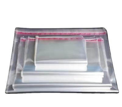 China Microwaveable Custom Clear Cellophane Plastic Bag Opp Opp Bopp Clear Plastic Self Adhesive Clothing Bag for sale