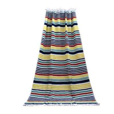 China OEM Jacquard Stripe Compressed Cotton Terry Tassel Beach Towel for sale