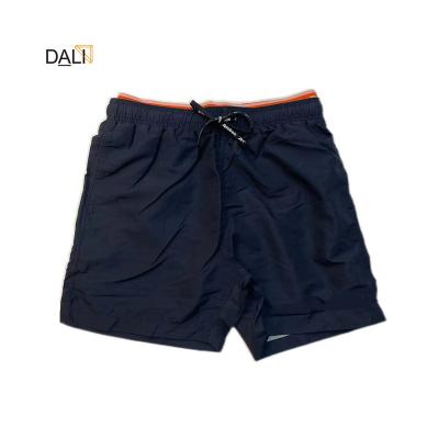 China OEM High Quality QUICK DRY Solid Lightweight Quick Dry Sporty Woven Fabric Men's And Women'S Polyester Print Swim Shorts Beach Shorts for sale