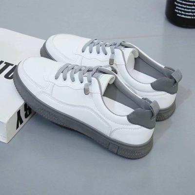 China Fashion Trend Low Price Promotion Casual Women's Sneakers Leather Daily Soft Flats Running Shoes for sale