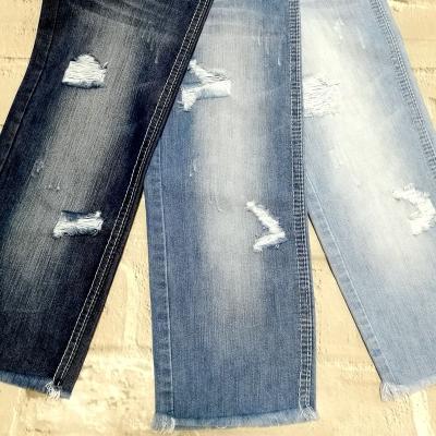 China 21715 Shrink-resistant new arrive glossy oxygen bar twill ripped denim fabric for pants for sale