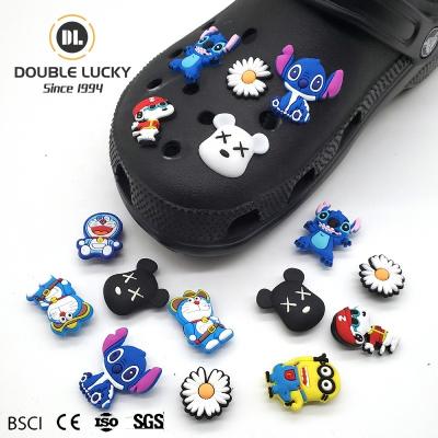 China Lucky New Style Wholesale Fashion Double Clog PVC Cartoon Shoe Charms Accessories Shoe Buckles Designer Croc Shoe Charms for sale