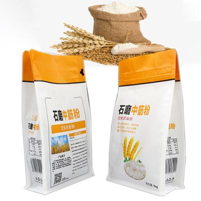 China Custom Printed Laminated Wheat Flour Rice 1KG Packing Bag Flat Bottom Moisture Proof Laminated Stand Up Pouch With Reusable Zipper for sale