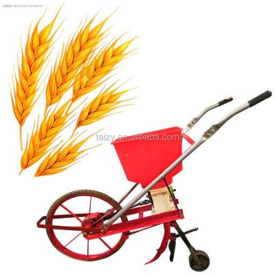 China Low price hand manual corn seeder machine soy bean seed planter machine for sale