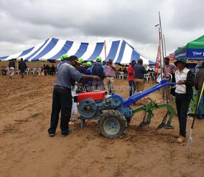 China Hand Tractor Price Philippines 18Hp Power Tiller With Plow High Quality Walking Tractor for sale