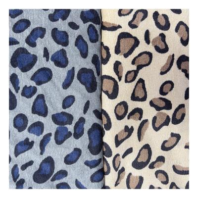 China New Design 100%Polyester Wind Proof Leopard Printing Heavy Corduroy Fabric For Women's Dress And Coat for sale